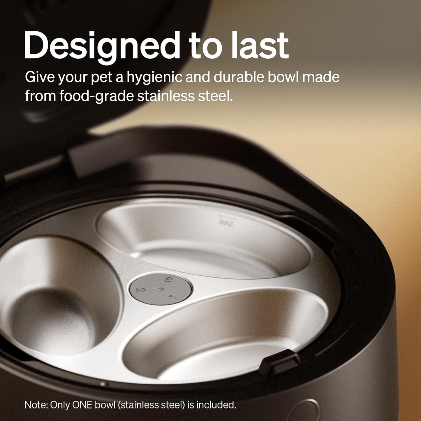Close-up of the Polar feeder's 3-compartment stainless steel tray filled with wet food