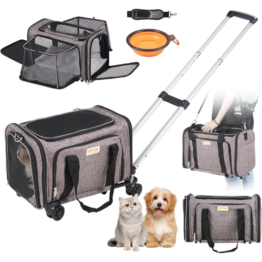 Grey rolling pet carrier with an orange collapsible bowl and black adjustable shoulder strap shown beside it