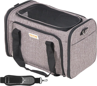 Grey rolling pet carrier shown from the back with its padded shoulder strap and top carry handle