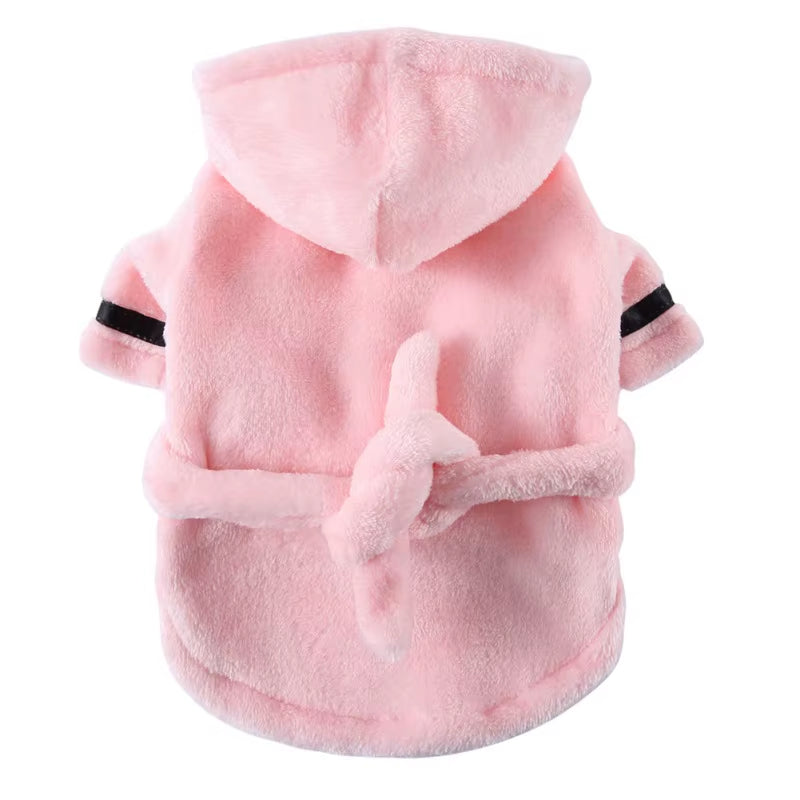Hooded dog bathrobe folded into a stack to show its overall size and plush texture