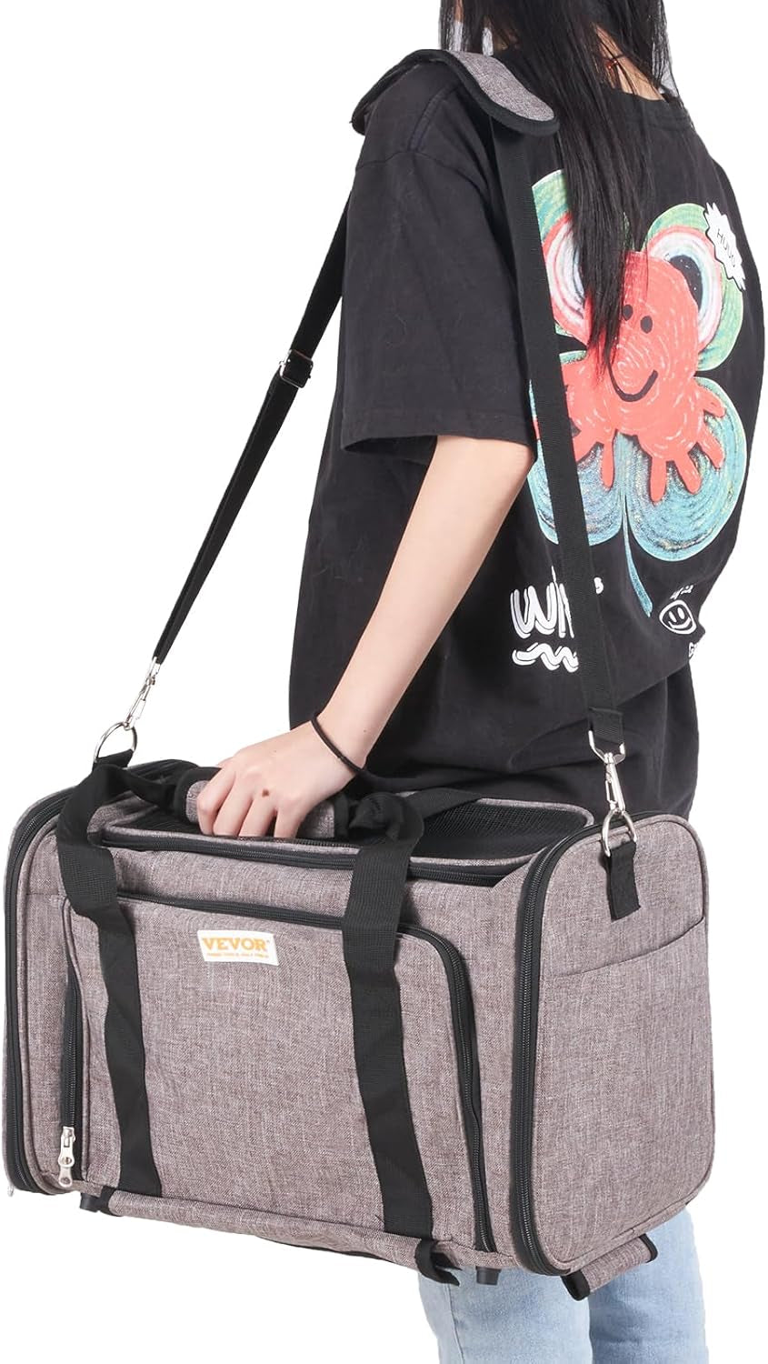 Cat and small dog sitting together in front of the grey VEVOR rolling pet carrier bag