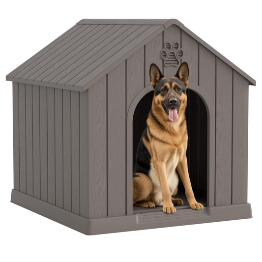 Grey plastic A-frame dog house with an arched doorway and a German Shepherd sitting inside