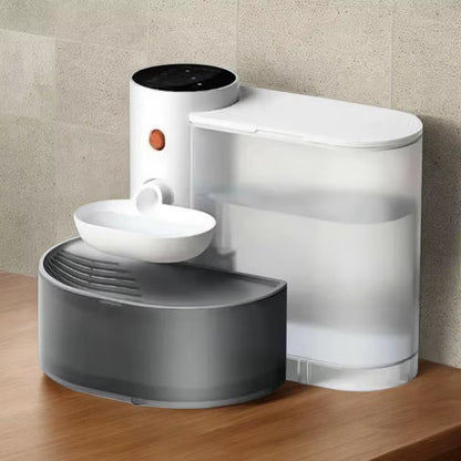 Tall white wireless pet fountain shown with its water reservoir and lid separated to show internal parts