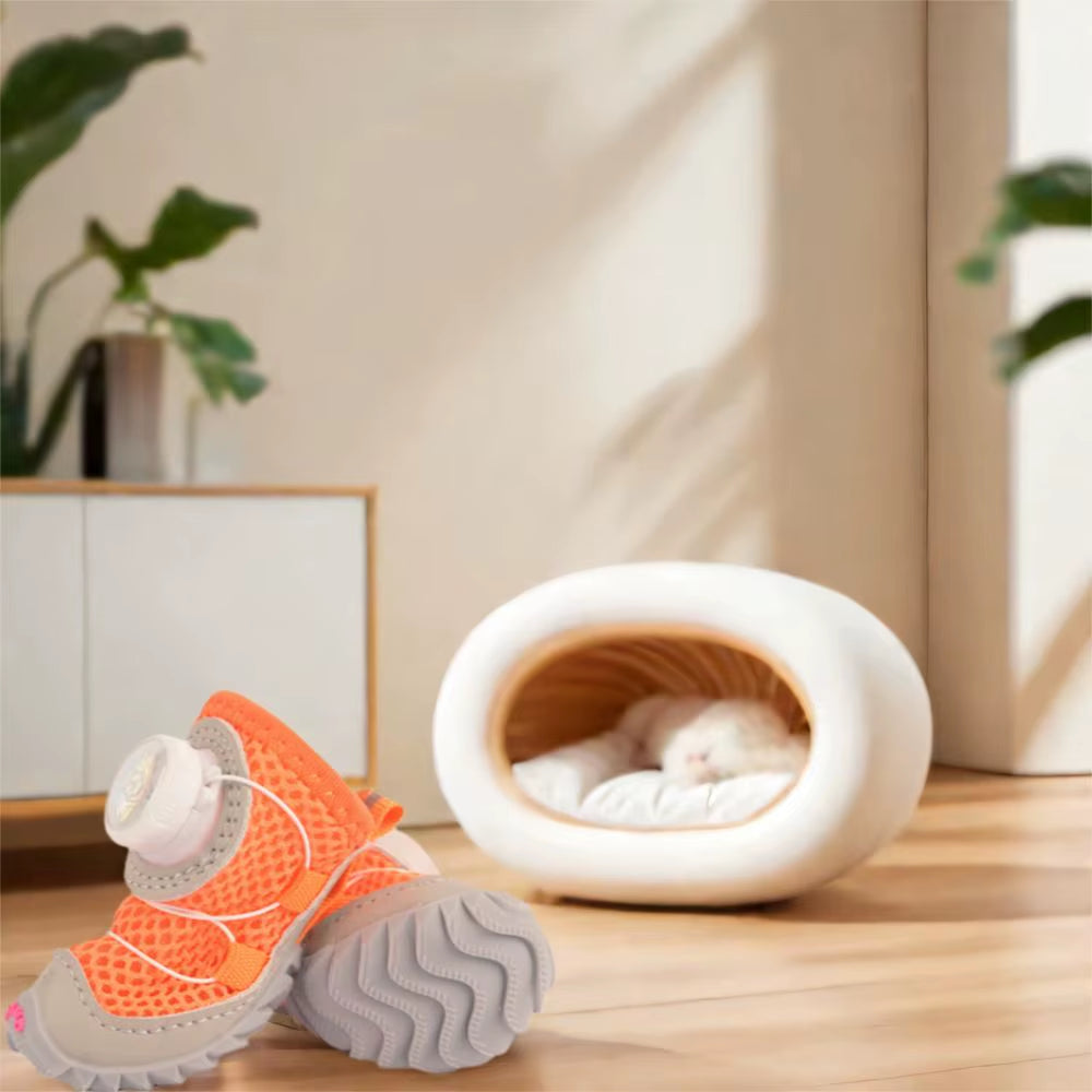 Mesh dog shoe shown from the side highlighting its low-profile ankle height and grey trim