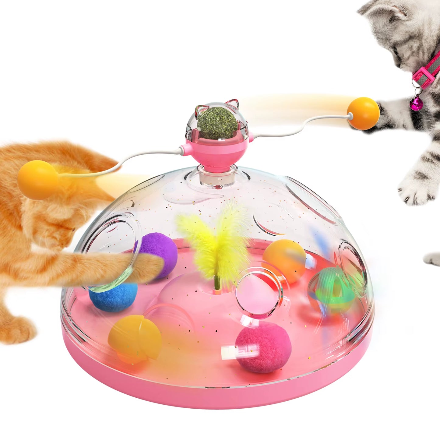 Pink version of the spinning dome cat toy with two cats batting at the swinging orange balls
