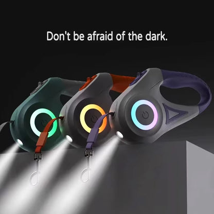 GlowPaw retractable leash shown with its cord extended and the metal clip at the end