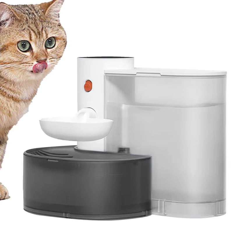 White and dark gray wireless pet fountain with a small elevated bowl and orange power button