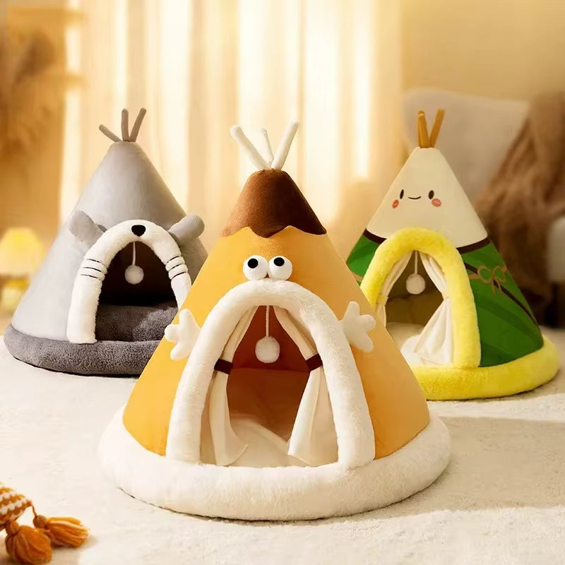 Three cone pet tents in grey, orange, and green styled with cartoon animal faces on the entrance