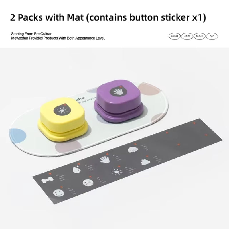 Yellow and purple talking buttons on an oval mat next to a black DIY label sticker sheet