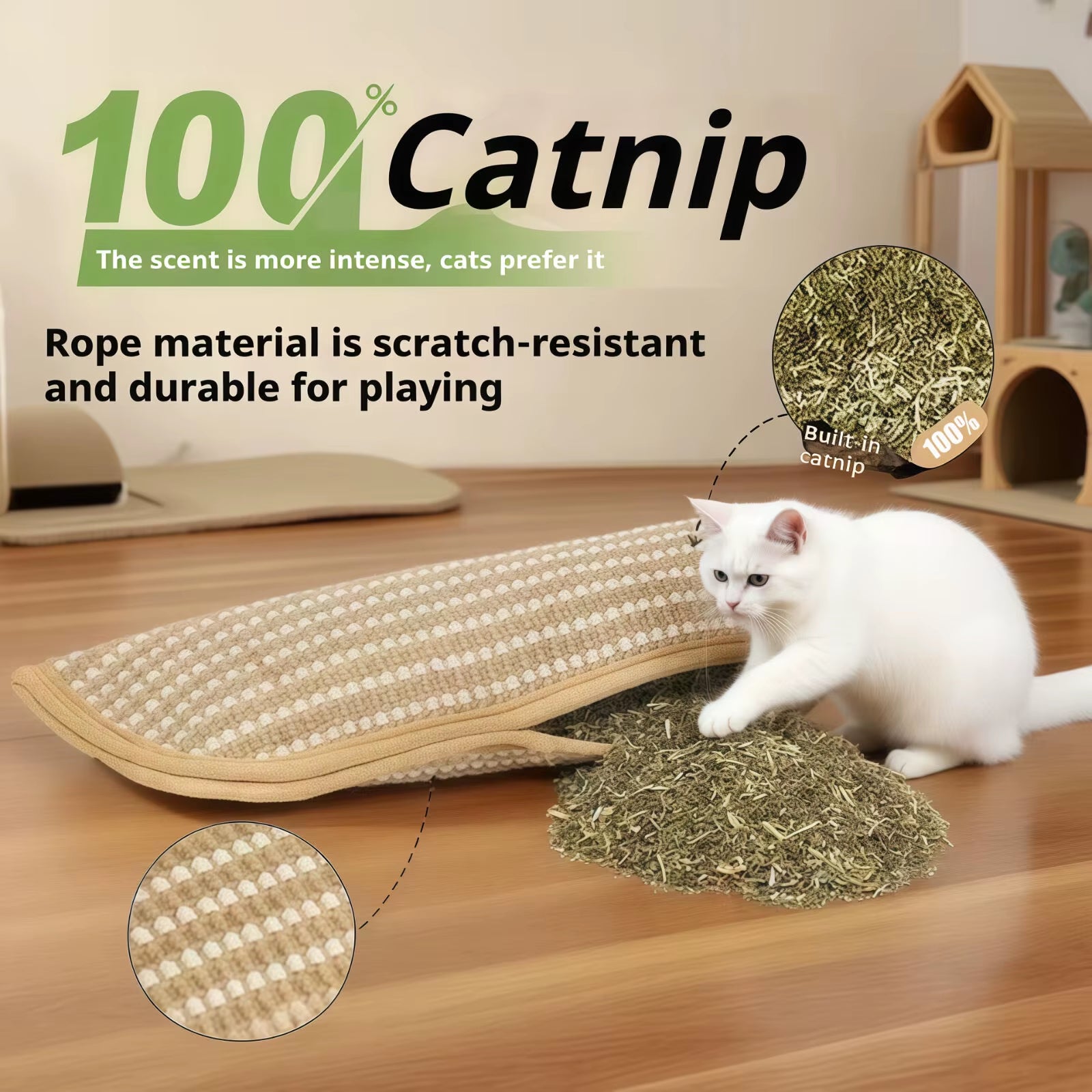 White kitten pawing at the catnip scratcher pad with a pile of loose catnip spilling from the seam