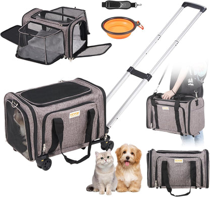 Grey VEVOR rolling pet carrier with its telescoping handle extended next to a person carrying it as a shoulder bag