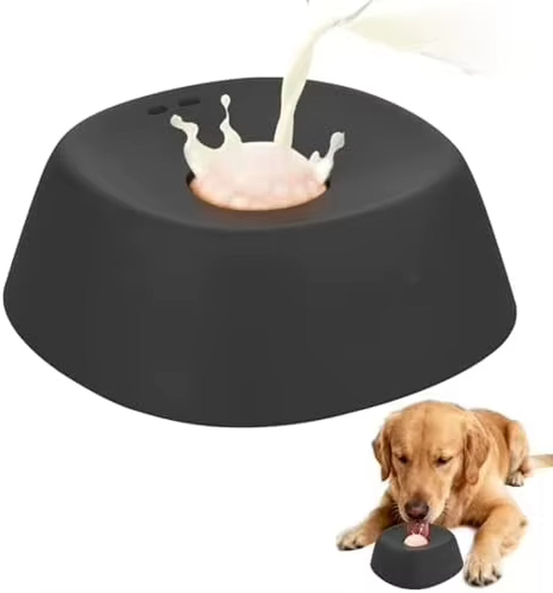 Black silicone slow feeder dog bowl with milk splashing into the center, next to a Golden Retriever