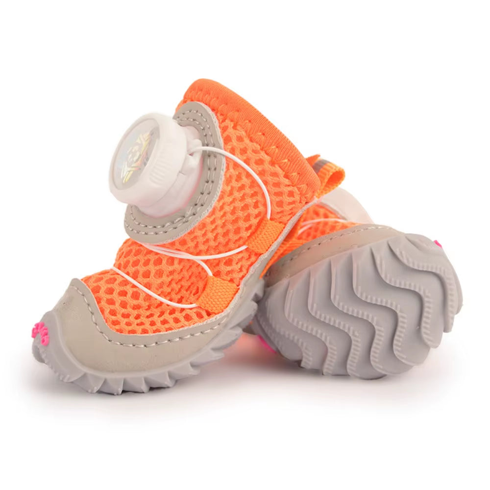 Four mesh dog shoes in matching color arranged in a row on a plain white background