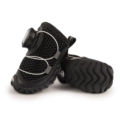 Close-up of the breathable mesh fabric texture and stitching on a dog shoe upper