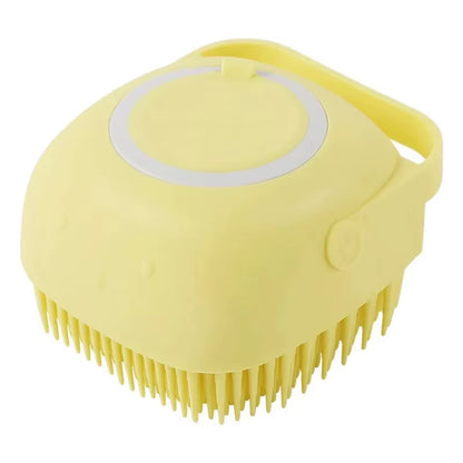 Small terrier puppy being bathed with soapy suds using the silicone bath massage brush